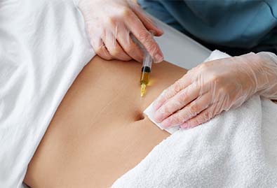high-angle-healthcare-professional-injecting-belly