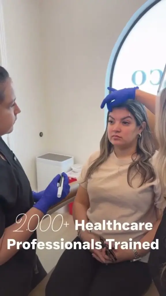 ITA instructor guiding a patient during hands-on injector training
